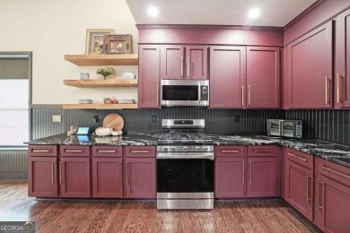 Welcome to this stunning 4-bedroom, 3-bath home in sought-after on Trophy Club of Apalachee in Georgia - for sale on GolfHomes.com, golf home, golf lot