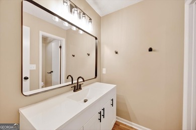 This 4-bedroom, 2-bath home has been completely updated from top on Golf Club of Macon in Georgia - for sale on GolfHomes.com, golf home, golf lot