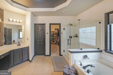 Welcome to this stunning 4-bedroom, 3-bath home in sought-after on Trophy Club of Apalachee in Georgia - for sale on GolfHomes.com, golf home, golf lot