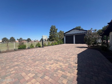 Stunning modern farmhouse barndominium adjoining Ironwood Golf on Ironwood Golf Club in Arizona - for sale on GolfHomes.com, golf home, golf lot