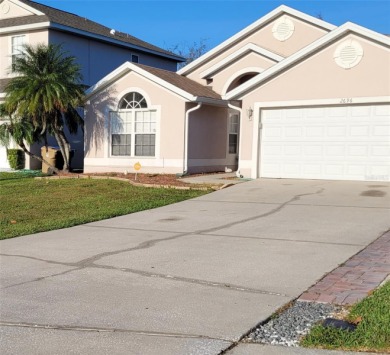 Located in the Remington Golf Community. This four-bed, two bath on Remington Golf Club in Florida - for sale on GolfHomes.com, golf home, golf lot