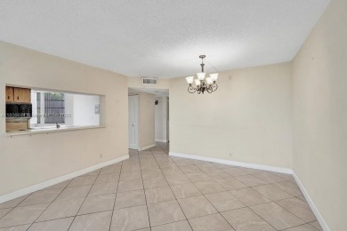 RARELY AVAILABLE AT THIS PRICE! Welcome to this spacious 3 on Pine Island Ridge Country Club in Florida - for sale on GolfHomes.com, golf home, golf lot