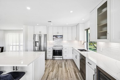 Take in stunning sunsets & serene fairway & lake views from your on Quail Ridge Golf Course and Country Club in Florida - for sale on GolfHomes.com, golf home, golf lot