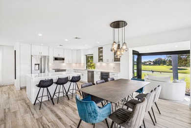 Take in stunning sunsets & serene fairway & lake views from your on Quail Ridge Golf Course and Country Club in Florida - for sale on GolfHomes.com, golf home, golf lot