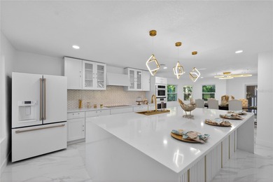 Located behind the gates of the exclusive, guard-gated on Sweetwater Country Club in Florida - for sale on GolfHomes.com, golf home, golf lot