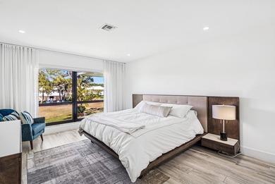 Take in stunning sunsets & serene fairway & lake views from your on Quail Ridge Golf Course and Country Club in Florida - for sale on GolfHomes.com, golf home, golf lot