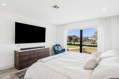 Take in stunning sunsets & serene fairway & lake views from your on Quail Ridge Golf Course and Country Club in Florida - for sale on GolfHomes.com, golf home, golf lot