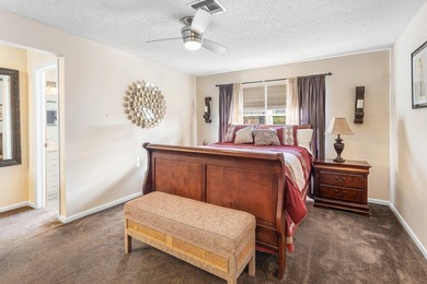 Enjoy easy Florida living in this well-cared-for 3-bedroom on Palm Beach National Golf and Country Club in Florida - for sale on GolfHomes.com, golf home, golf lot