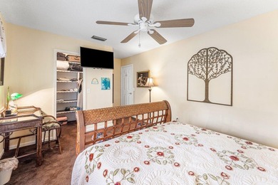 Enjoy easy Florida living in this well-cared-for 3-bedroom on Palm Beach National Golf and Country Club in Florida - for sale on GolfHomes.com, golf home, golf lot