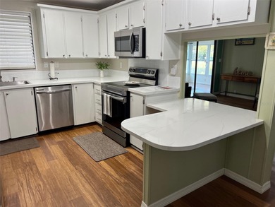 WATERFRONT: Gorgeous waterfront home in Paradise Island with on Fairway Village Golf Course in Florida - for sale on GolfHomes.com, golf home, golf lot