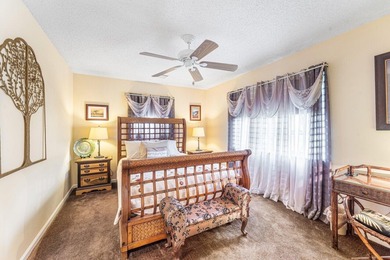 Enjoy easy Florida living in this well-cared-for 3-bedroom on Palm Beach National Golf and Country Club in Florida - for sale on GolfHomes.com, golf home, golf lot