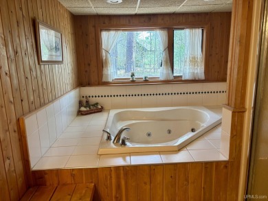 Awesome river setting with over 1,000' of Chocolay River on Northern Michigan University Golf Course (NMU) in Michigan - for sale on GolfHomes.com, golf home, golf lot