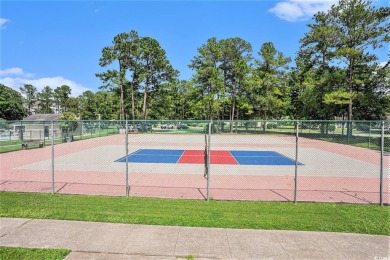 Welcome to your perfect retreat in the charming efficiency unit on Heron Point Golf Club in South Carolina - for sale on GolfHomes.com, golf home, golf lot