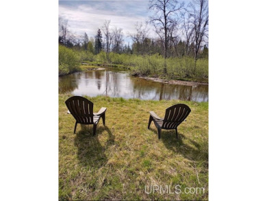Awesome river setting with over 1,000' of Chocolay River on Northern Michigan University Golf Course (NMU) in Michigan - for sale on GolfHomes.com, golf home, golf lot
