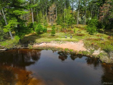 Awesome river setting with over 1,000' of Chocolay River on Northern Michigan University Golf Course (NMU) in Michigan - for sale on GolfHomes.com, golf home, golf lot