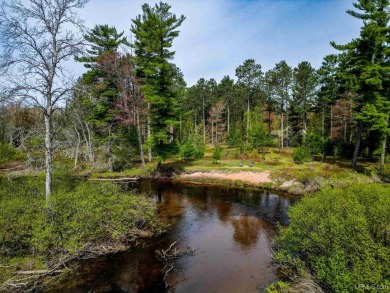 Awesome river setting with over 1,000' of Chocolay River on Northern Michigan University Golf Course (NMU) in Michigan - for sale on GolfHomes.com, golf home, golf lot