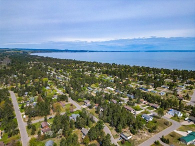 Awesome river setting with over 1,000' of Chocolay River on Northern Michigan University Golf Course (NMU) in Michigan - for sale on GolfHomes.com, golf home, golf lot