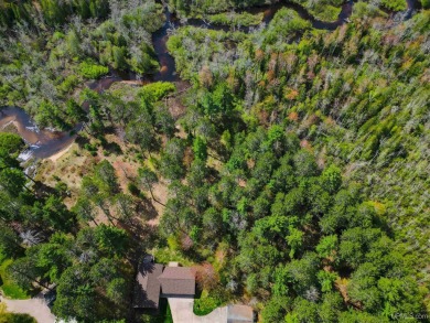 Awesome river setting with over 1,000' of Chocolay River on Northern Michigan University Golf Course (NMU) in Michigan - for sale on GolfHomes.com, golf home, golf lot