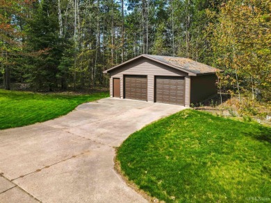 Awesome river setting with over 1,000' of Chocolay River on Northern Michigan University Golf Course (NMU) in Michigan - for sale on GolfHomes.com, golf home, golf lot