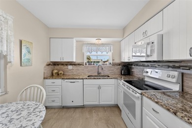 Welcome to this charming, tastefully updated 2-bedroom, 2-bath on North Lakes Golf Course in Florida - for sale on GolfHomes.com, golf home, golf lot