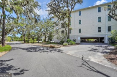 The view of Jekyll Harbor takes center stage in this 3 bedroom 3 on Jekyll Island Golf Club in Georgia - for sale on GolfHomes.com, golf home, golf lot