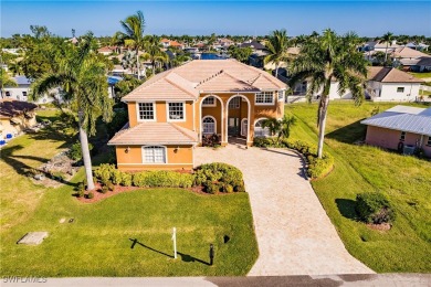 Welcome to paradise in Southwest Cape Coral! This luxurious on Royal Tee Country Club in Florida - for sale on GolfHomes.com, golf home, golf lot