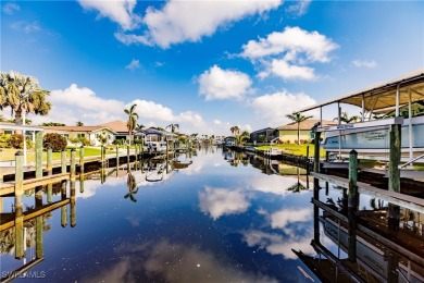 Welcome to paradise in Southwest Cape Coral! This luxurious on Royal Tee Country Club in Florida - for sale on GolfHomes.com, golf home, golf lot