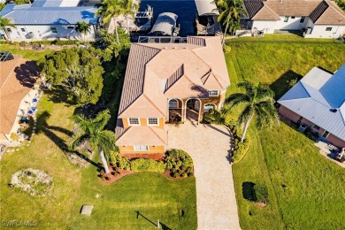 Welcome to paradise in Southwest Cape Coral! This luxurious on Royal Tee Country Club in Florida - for sale on GolfHomes.com, golf home, golf lot