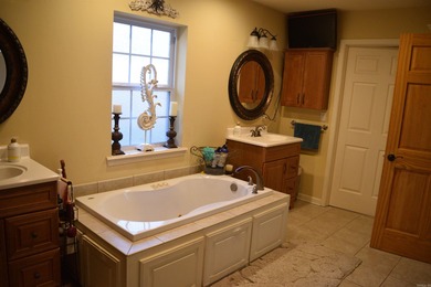 Welcome to your dream home located on the 15th tee box of Indian on Mountain Ranch Golf Club in Arkansas - for sale on GolfHomes.com, golf home, golf lot