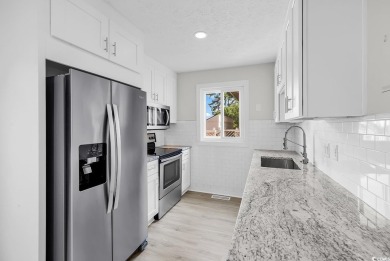 Renovated top to bottom, this Shorewood unit located less than on Myrtlewood Golf Course and Club  in South Carolina - for sale on GolfHomes.com, golf home, golf lot