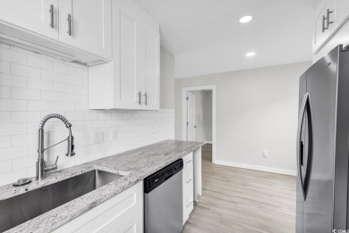 Renovated top to bottom, this Shorewood unit located less than on Myrtlewood Golf Course and Club  in South Carolina - for sale on GolfHomes.com, golf home, golf lot