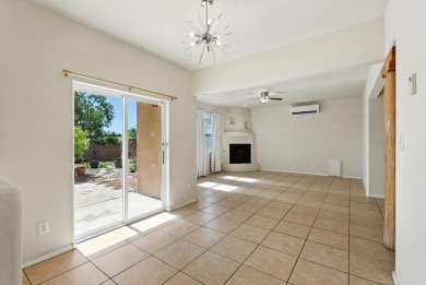 Welcome Home! To this spacious 4 bed 3 bath with mountain & golf on Santa Fe Country Club in New Mexico - for sale on GolfHomes.com, golf home, golf lot