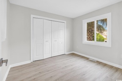 Renovated top to bottom, this Shorewood unit located less than on Myrtlewood Golf Course and Club  in South Carolina - for sale on GolfHomes.com, golf home, golf lot