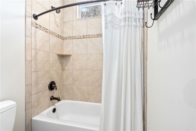 Location, location, location! This beautiful 3BR, 2.5BA home is on Grand National Golf Course in Alabama - for sale on GolfHomes.com, golf home, golf lot