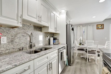 Welcome to this beautifully renovated condo in Century Village on Hillsboro Pines Golf in Florida - for sale on GolfHomes.com, golf home, golf lot