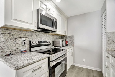 Welcome to this beautifully renovated condo in Century Village on Hillsboro Pines Golf in Florida - for sale on GolfHomes.com, golf home, golf lot