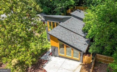 Stunning Mid-Century Modern Gem in Adams Park! Welcome to this on Alfred Tup Holmes Golf Course in Georgia - for sale on GolfHomes.com, golf home, golf lot