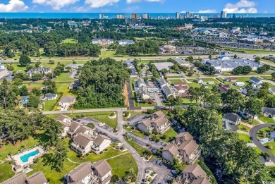 Renovated top to bottom, this Shorewood unit located less than on Myrtlewood Golf Course and Club  in South Carolina - for sale on GolfHomes.com, golf home, golf lot