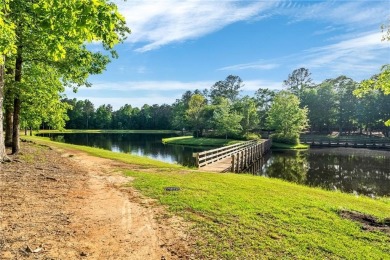 Location, location, location! This beautiful 3BR, 2.5BA home is on Grand National Golf Course in Alabama - for sale on GolfHomes.com, golf home, golf lot