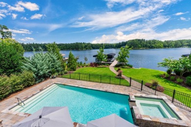 Experience luxury lakefront living at its finest in this on Reynolds Lake Oconee - The Creek Club in Georgia - for sale on GolfHomes.com, golf home, golf lot