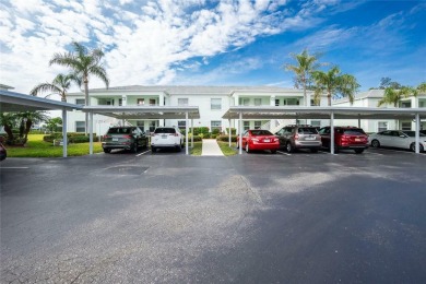 MOVE RIGHT IN to this IMMACULATE second floor unit, with a on Sabal Trace Golf and Country Club in Florida - for sale on GolfHomes.com, golf home, golf lot