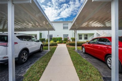 MOVE RIGHT IN to this IMMACULATE second floor unit, with a on Sabal Trace Golf and Country Club in Florida - for sale on GolfHomes.com, golf home, golf lot