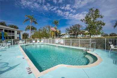 MOVE RIGHT IN to this IMMACULATE second floor unit, with a on Sabal Trace Golf and Country Club in Florida - for sale on GolfHomes.com, golf home, golf lot