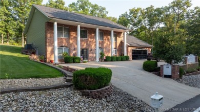 Beautifully updated GRAND 2 Story in Country Club Estates will on Seasons Ridge At Four Seasons in Missouri - for sale on GolfHomes.com, golf home, golf lot