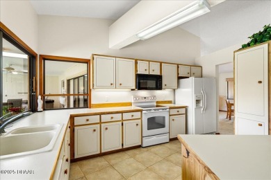 Charming 3-Bed, 2-Bath Pool Home on the Golf Course! This on The Grand Club - Pine Lakes Course in Florida - for sale on GolfHomes.com, golf home, golf lot
