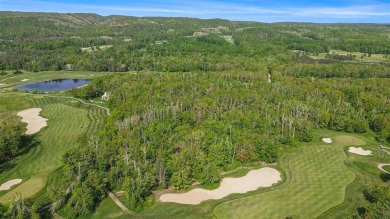 Build your dream retreat on this prime .63-acre parcel nestled on Wequetonsing Golf Course in Michigan - for sale on GolfHomes.com, golf home, golf lot