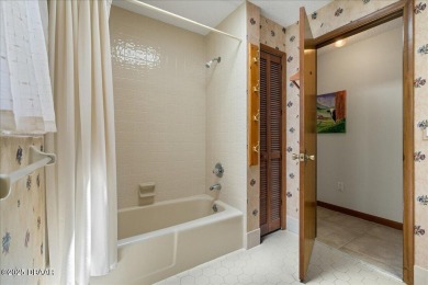 Charming 3-Bed, 2-Bath Pool Home on the Golf Course! This on The Grand Club - Pine Lakes Course in Florida - for sale on GolfHomes.com, golf home, golf lot