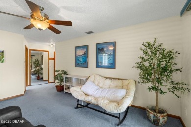 Charming 3-Bed, 2-Bath Pool Home on the Golf Course! This on The Grand Club - Pine Lakes Course in Florida - for sale on GolfHomes.com, golf home, golf lot