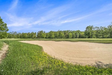 Build your dream retreat on this prime .63-acre parcel nestled on Wequetonsing Golf Course in Michigan - for sale on GolfHomes.com, golf home, golf lot