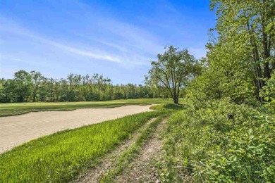 Build your dream retreat on this prime .63-acre parcel nestled on Wequetonsing Golf Course in Michigan - for sale on GolfHomes.com, golf home, golf lot